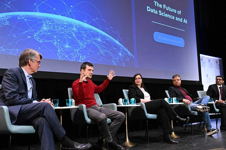 panelists on stage