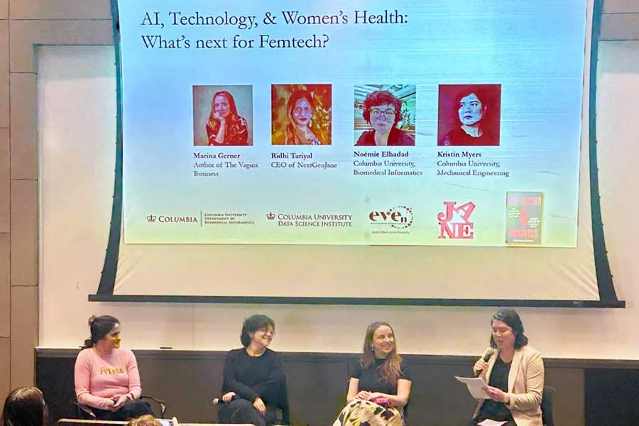 four female panelists during a presentation