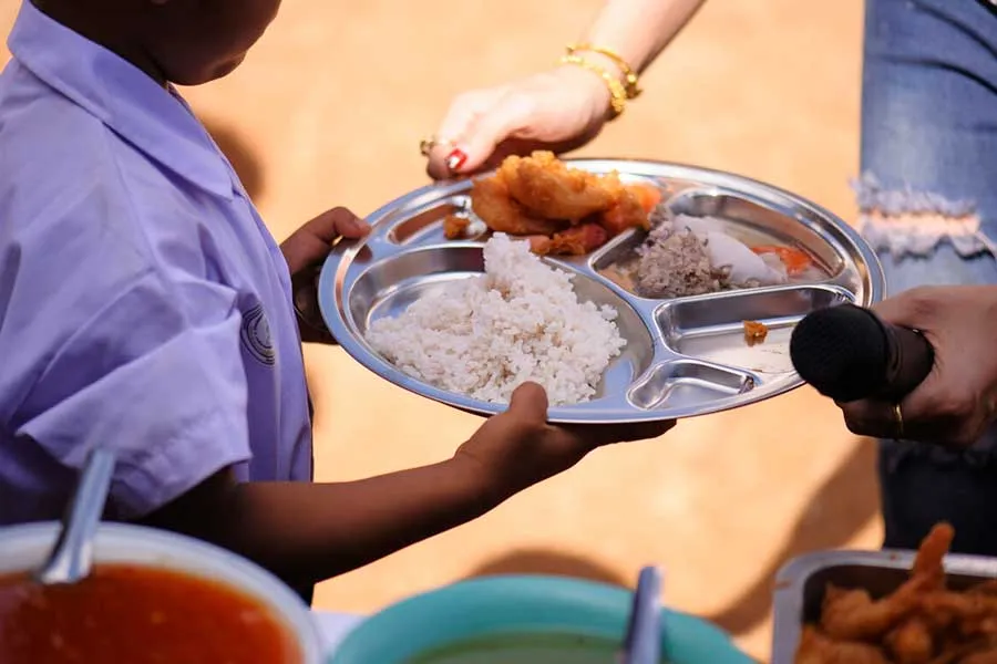 Istock photo of small child being served food