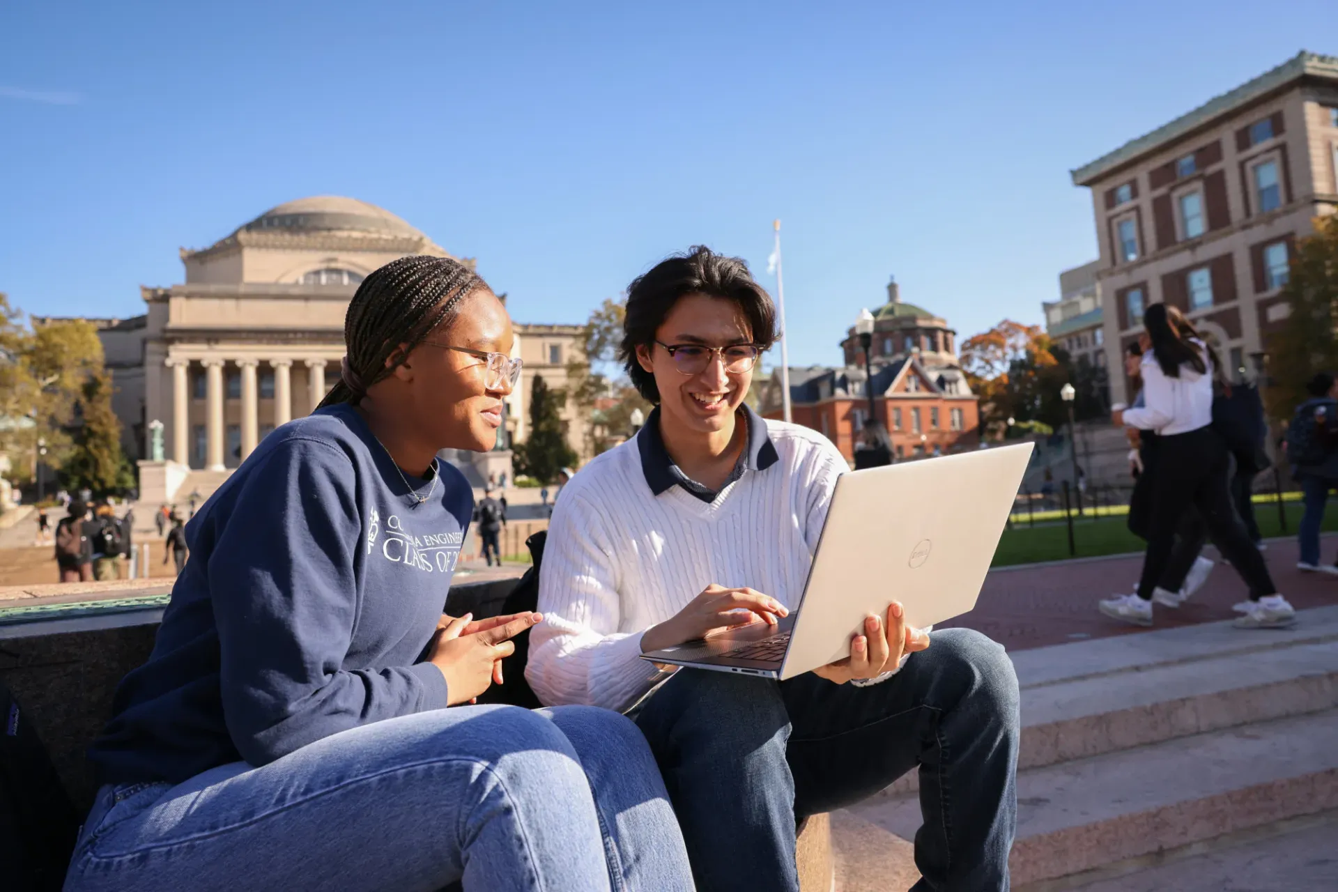 two people meeting on the campus of Columbia University_photo by John Abbott