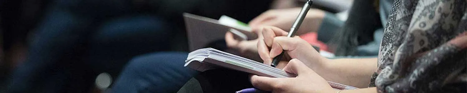 students taking notes in classroom