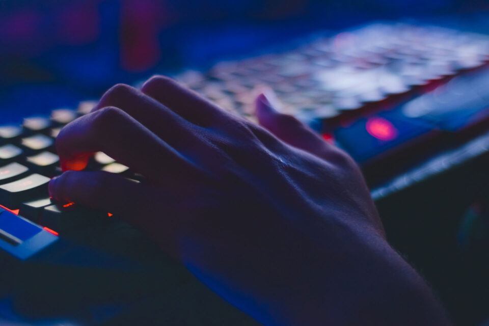 Hand typing on keyboard