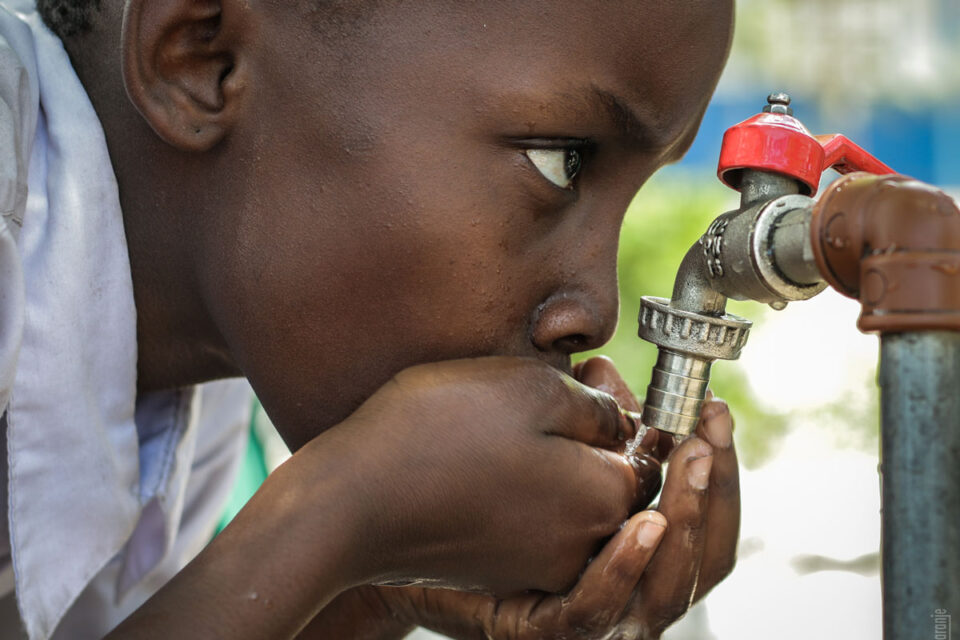 child drinking water